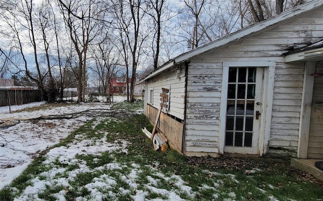 view of snow covered property