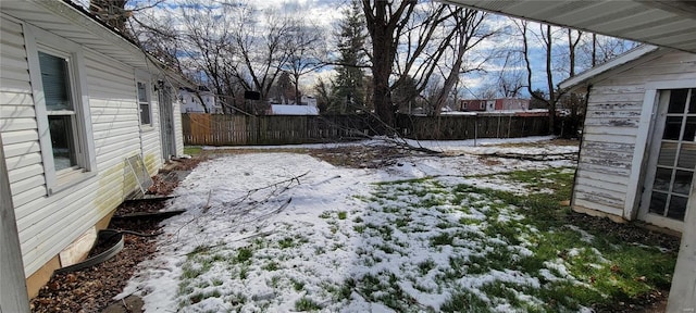 view of yard covered in snow