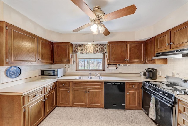 kitchen featuring backsplash, ceiling fan, sink, and black appliances