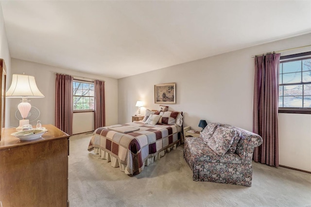 bedroom with light colored carpet