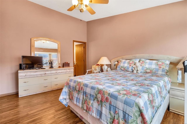 bedroom with ceiling fan and light hardwood / wood-style flooring