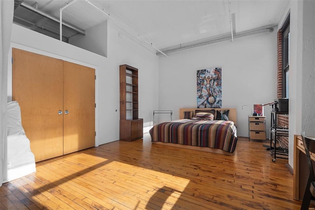 bedroom featuring hardwood / wood-style flooring