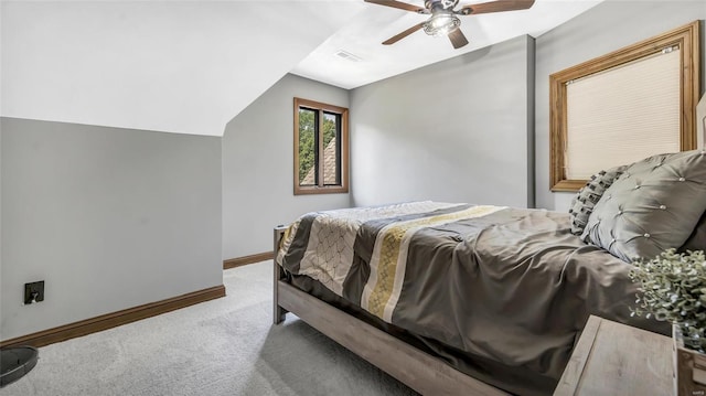 bedroom with vaulted ceiling, carpet, and ceiling fan