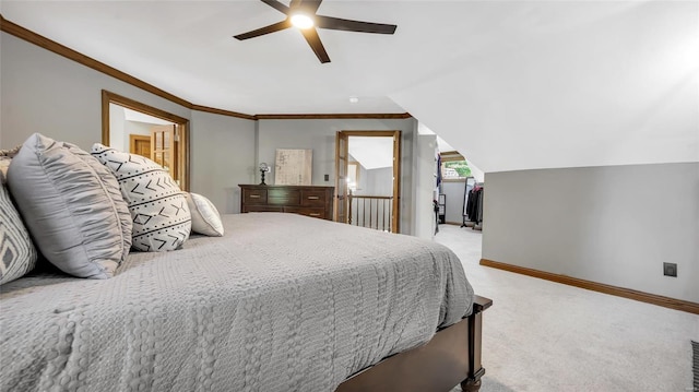 bedroom featuring light carpet, crown molding, lofted ceiling, and ceiling fan