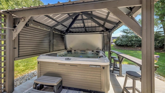 view of patio with a gazebo and a hot tub