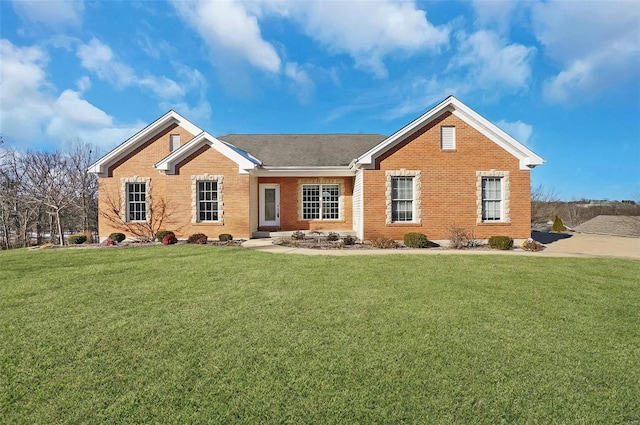 ranch-style house featuring a front lawn