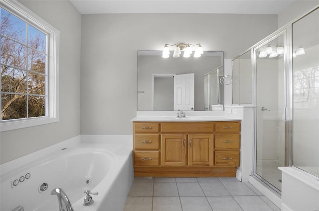 bathroom featuring vanity, separate shower and tub, and tile patterned flooring