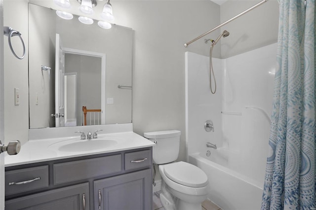 full bathroom with vanity, toilet, and shower / tub combo