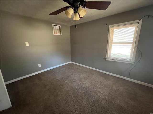 carpeted empty room with ceiling fan