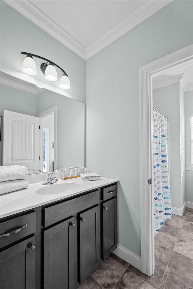 bathroom featuring vanity and crown molding