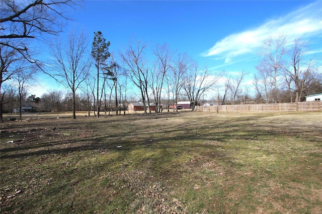 view of yard with a rural view