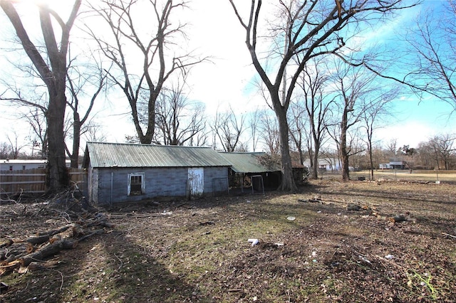 exterior space featuring an outbuilding