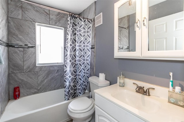 full bathroom with vanity, toilet, and shower / bath combo