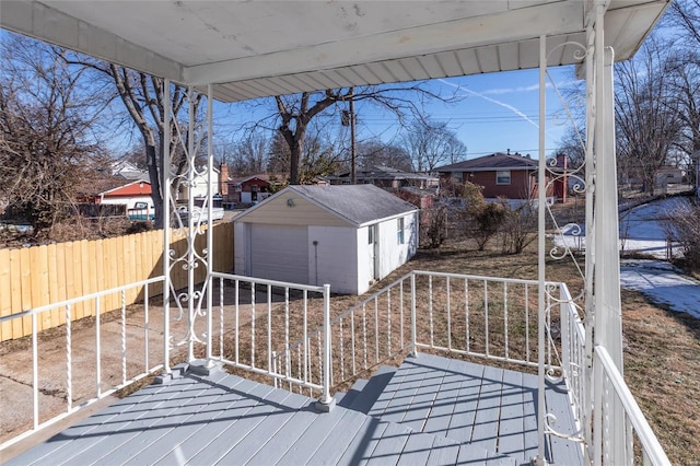 deck featuring a storage shed