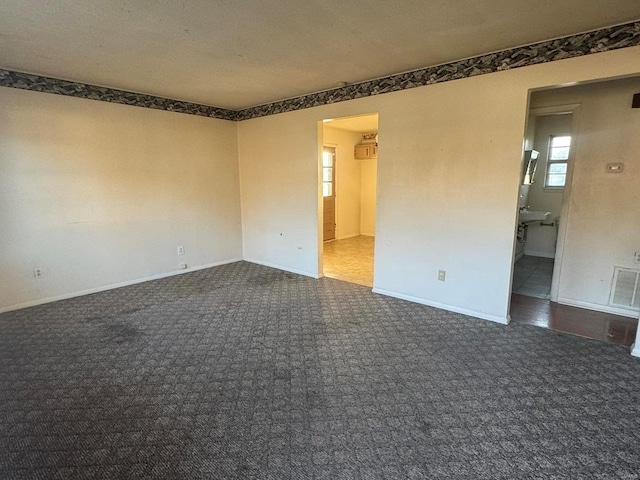 view of carpeted spare room