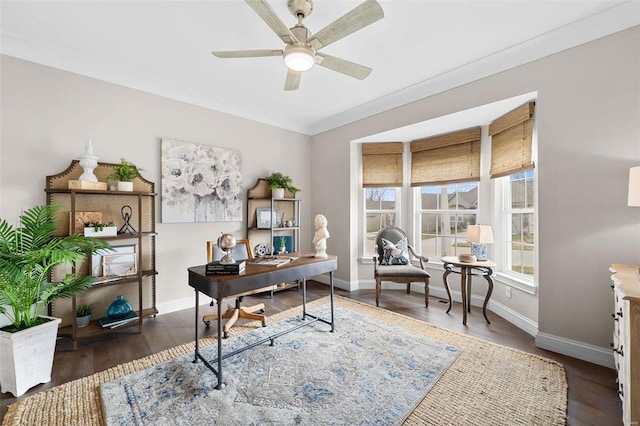 office with dark hardwood / wood-style flooring, crown molding, and ceiling fan