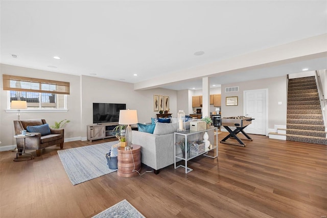 living room featuring wood-type flooring