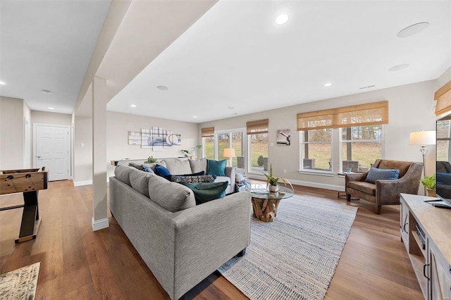 living room with light hardwood / wood-style floors