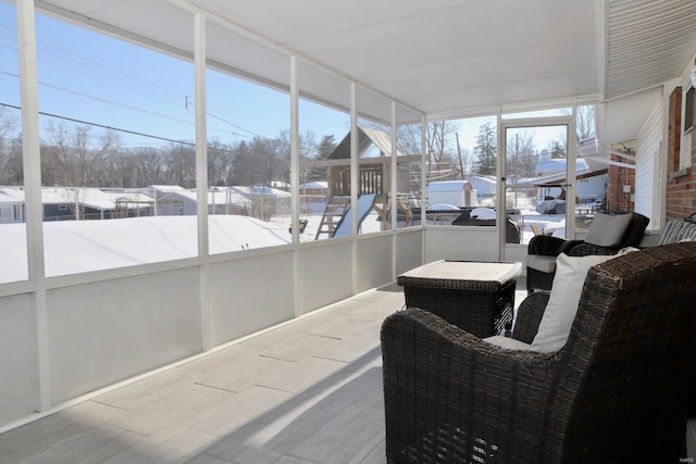 sunroom featuring a healthy amount of sunlight