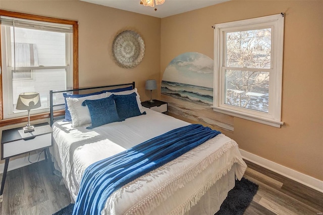 bedroom with hardwood / wood-style flooring