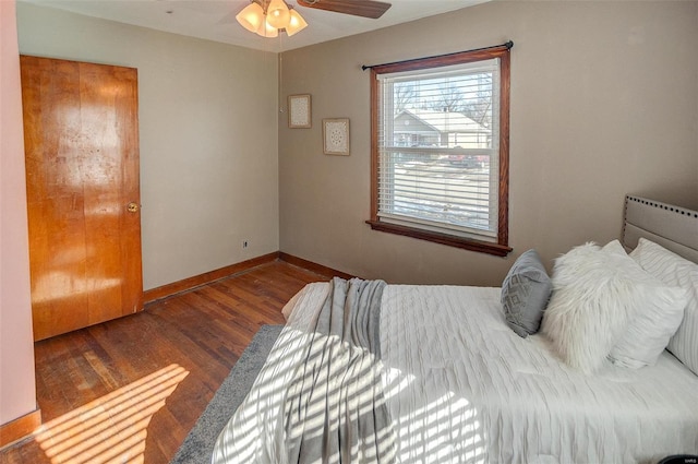 bedroom featuring wood-type flooring and ceiling fan