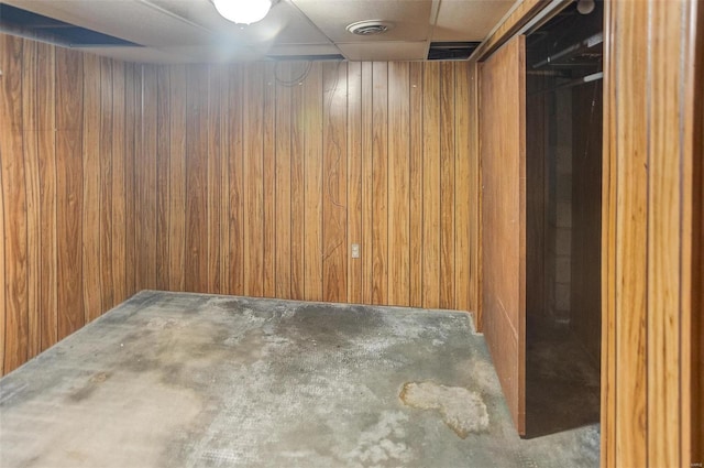 basement with wood walls