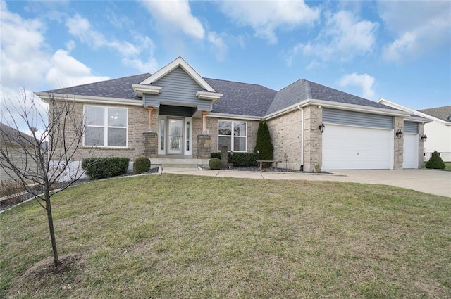 view of front facade with a garage and a front yard