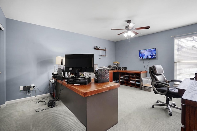 office featuring light colored carpet and ceiling fan