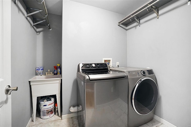 washroom featuring separate washer and dryer