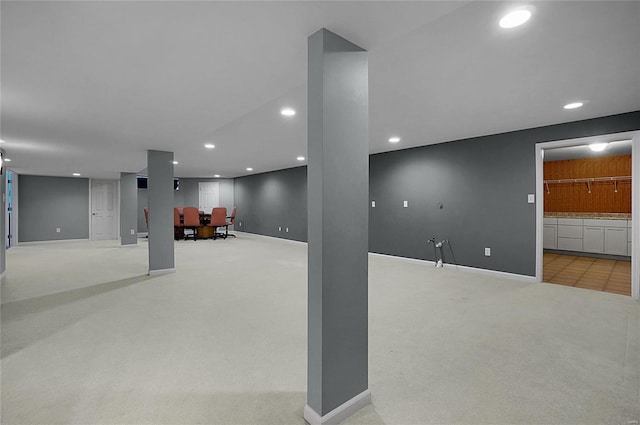 basement with light carpet