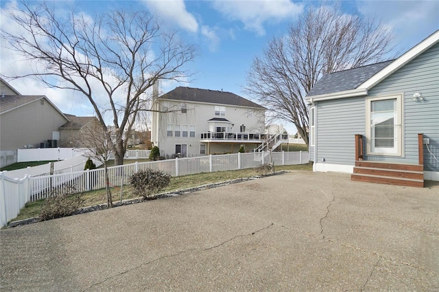 view of property exterior featuring a patio area