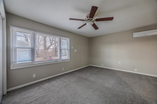 carpeted empty room with ceiling fan, a healthy amount of sunlight, and a wall mounted AC