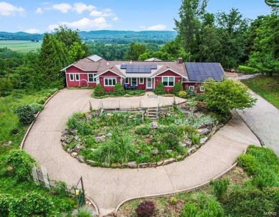 view of front of home with solar panels