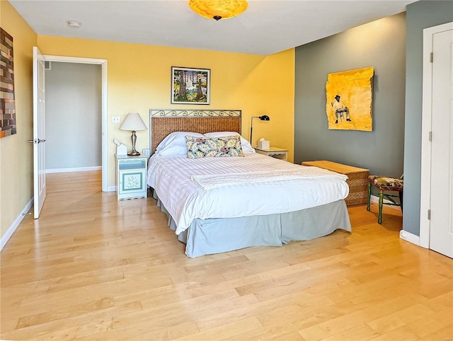 bedroom with light hardwood / wood-style floors