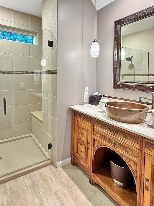 bathroom featuring vanity and walk in shower