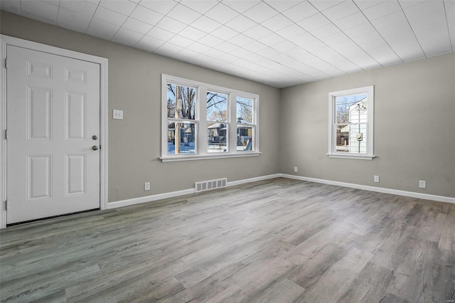 entrance foyer with light hardwood / wood-style floors