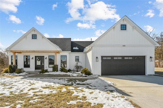 modern farmhouse style home with a garage