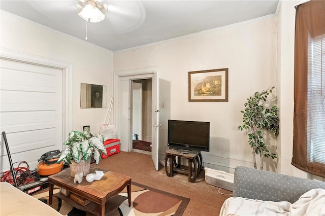 living room with crown molding and carpet flooring