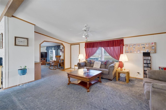 carpeted living room with crown molding, ceiling fan, and lofted ceiling