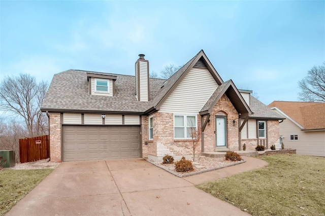 view of front of house featuring brick siding, a chimney, a shingled roof, fence, and driveway