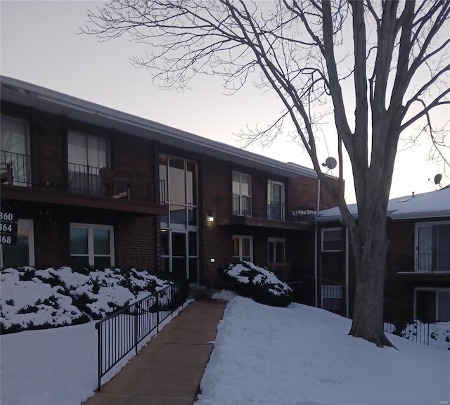 view of snow covered property