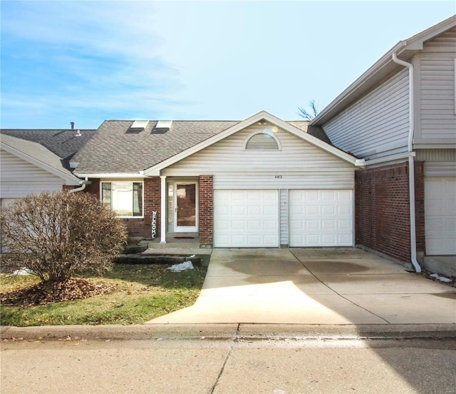 view of front of home with a garage