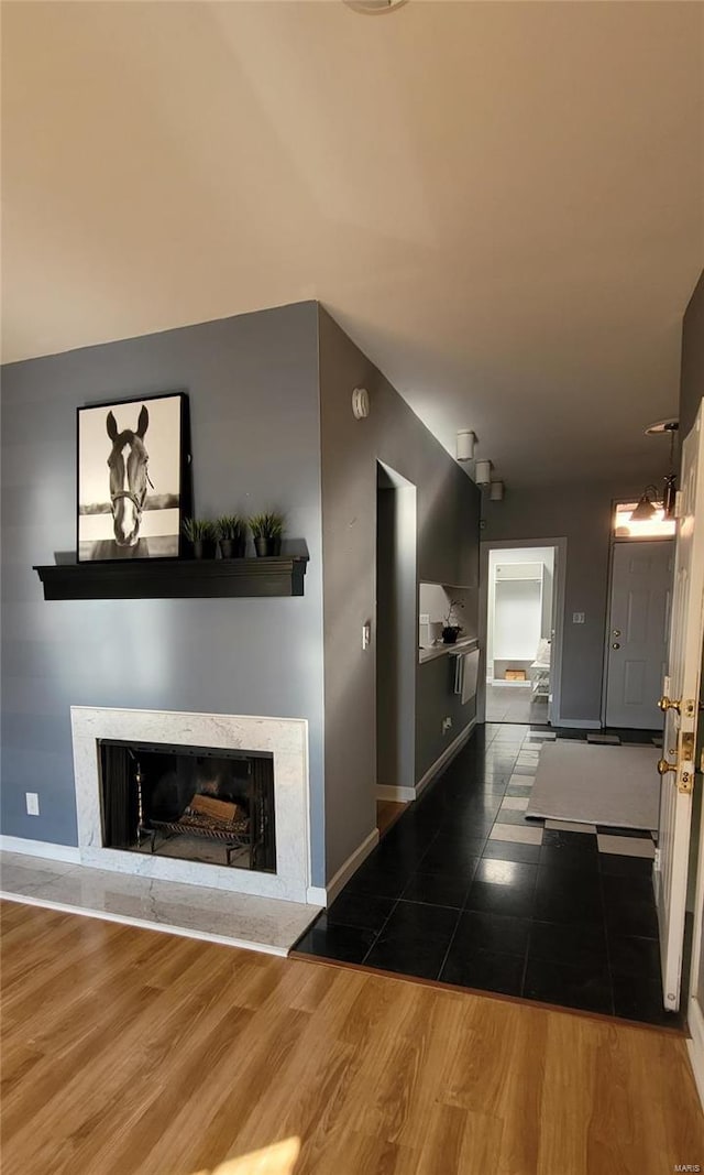 unfurnished living room featuring dark hardwood / wood-style floors