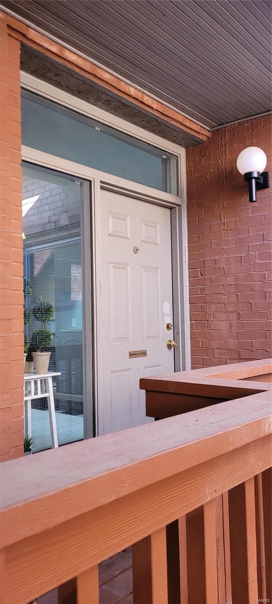 doorway to property with a balcony