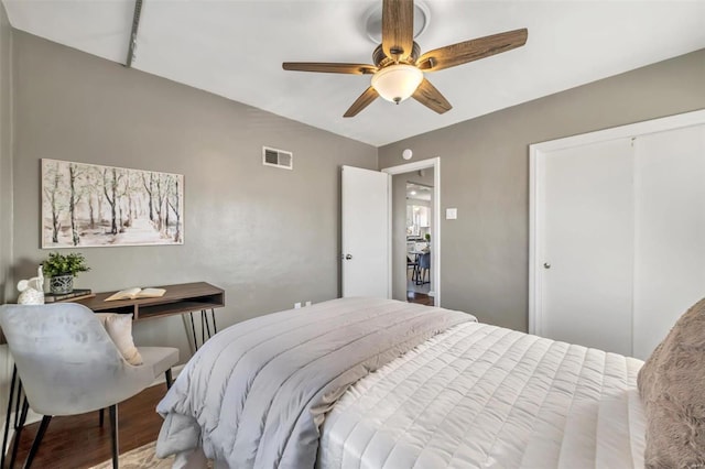 bedroom with wood-type flooring and ceiling fan