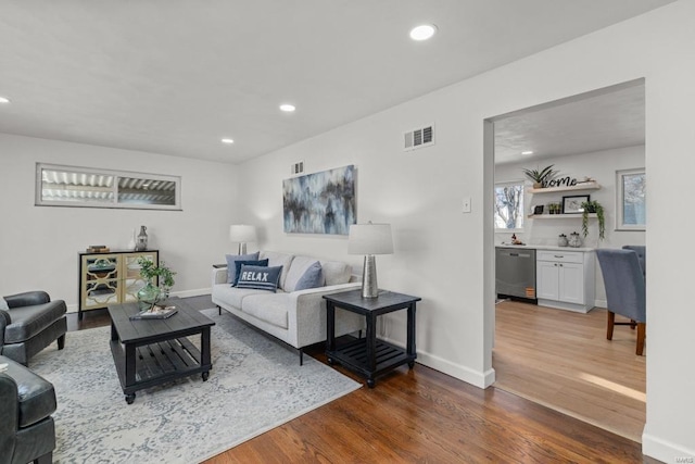 living room with dark hardwood / wood-style floors