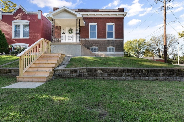 view of front of home with a front yard