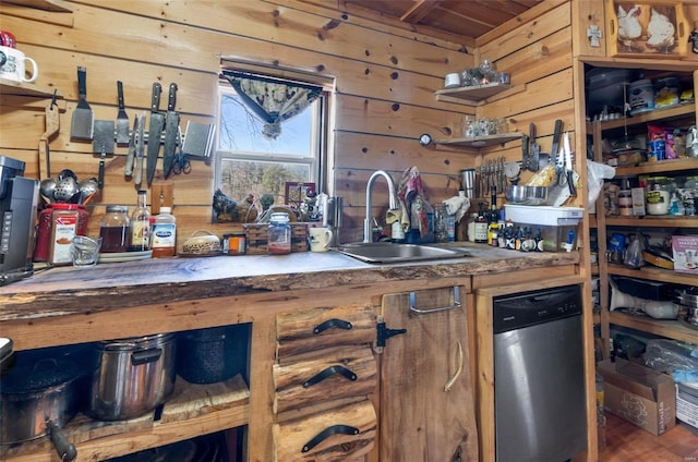 bar with stainless steel dishwasher, sink, and wood walls