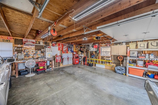 garage with a workshop area