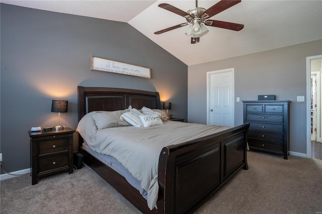 bedroom featuring ceiling fan, light colored carpet, and lofted ceiling